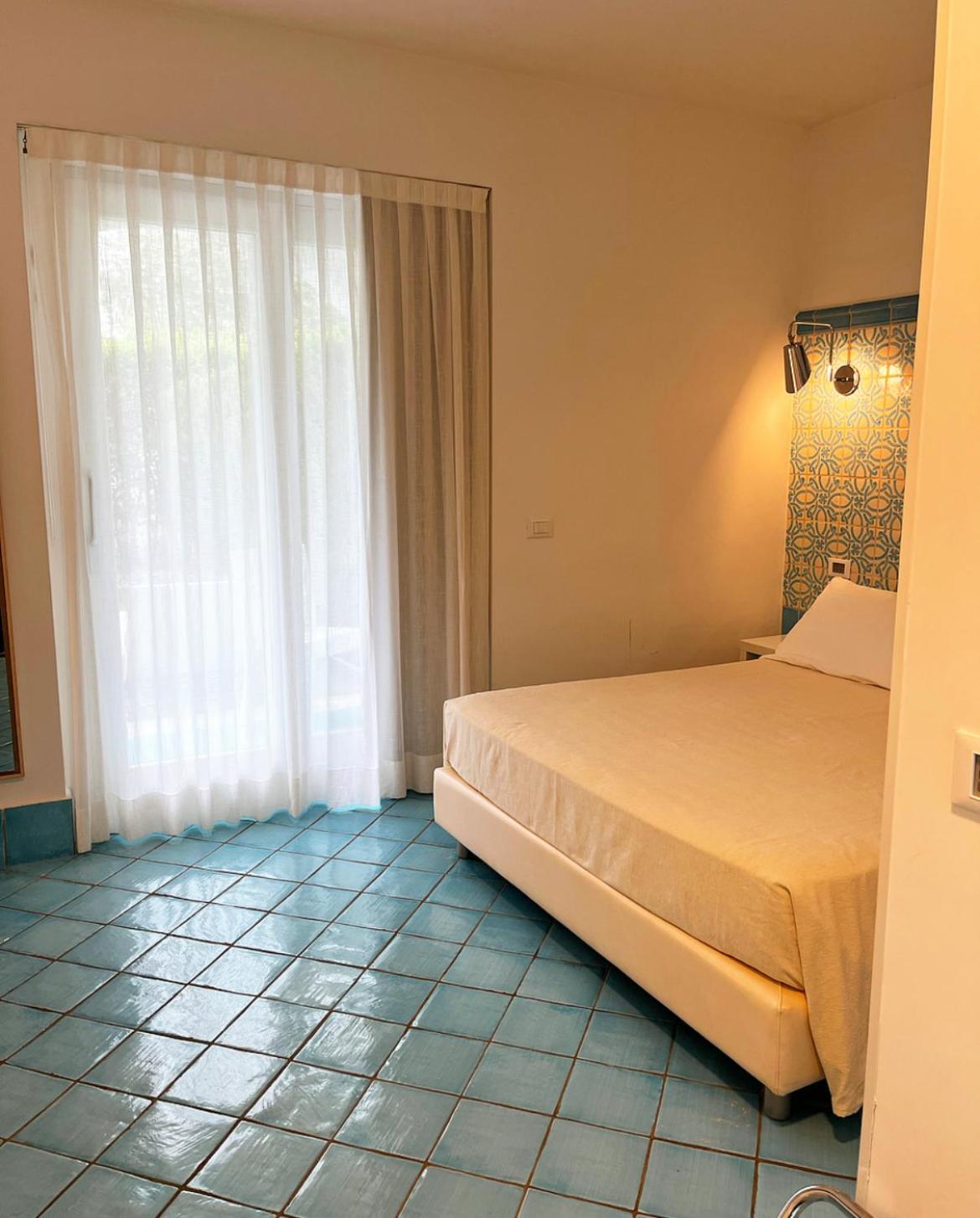 ספרלונגה Ganimede Hotel חדר תמונה